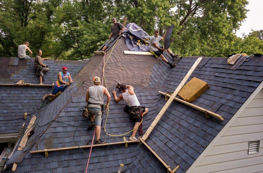 Roofing crew installing shingles — Vascontractors, Fairfield County CT roofing contractor