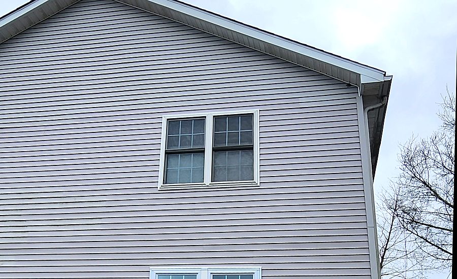 New vinyl siding installed on a Fairfield County, CT home, with finished trim and roofline